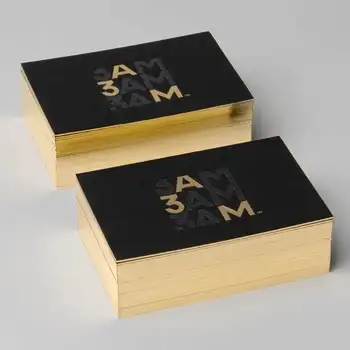 печать визитных картонов из черного картона с фольгированным краем 700гсм с золотым краем
