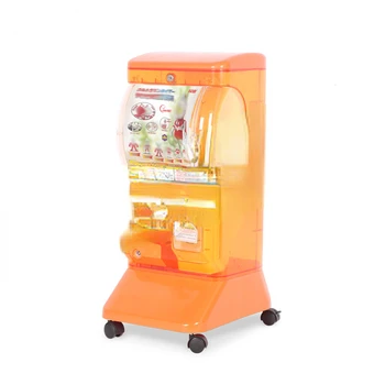 японский автомат по продаже капсульных игрушек с монетоприемником gashapon